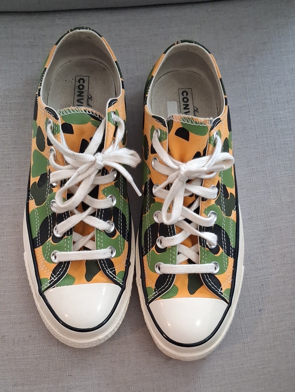 Converse Low-Top Sneakers in Yellow, Green & Black Camo